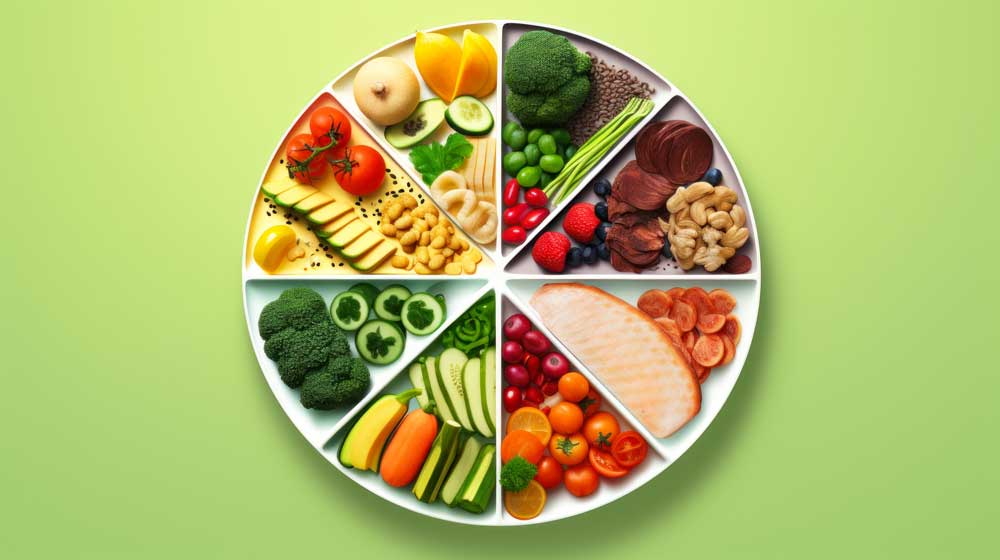plate filled with fruits and vegetables with green background