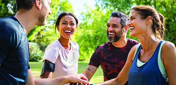 Young athletes talking in a park